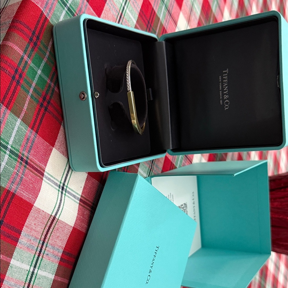 Tiffany & Co. Two-Tone lock Bracelet in Gold and Silver